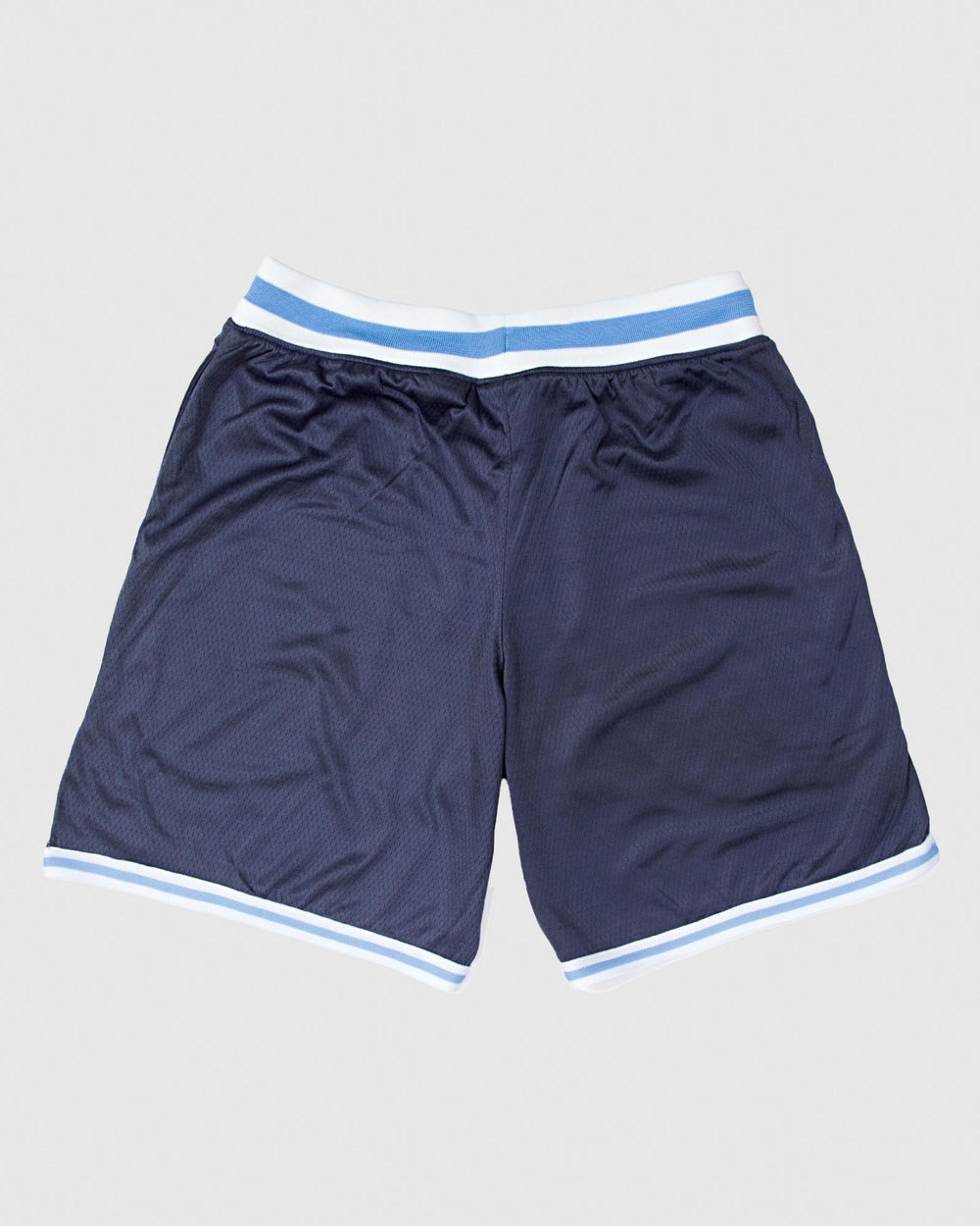 Back of navy mesh shorts with blue and white waistband#color_navy