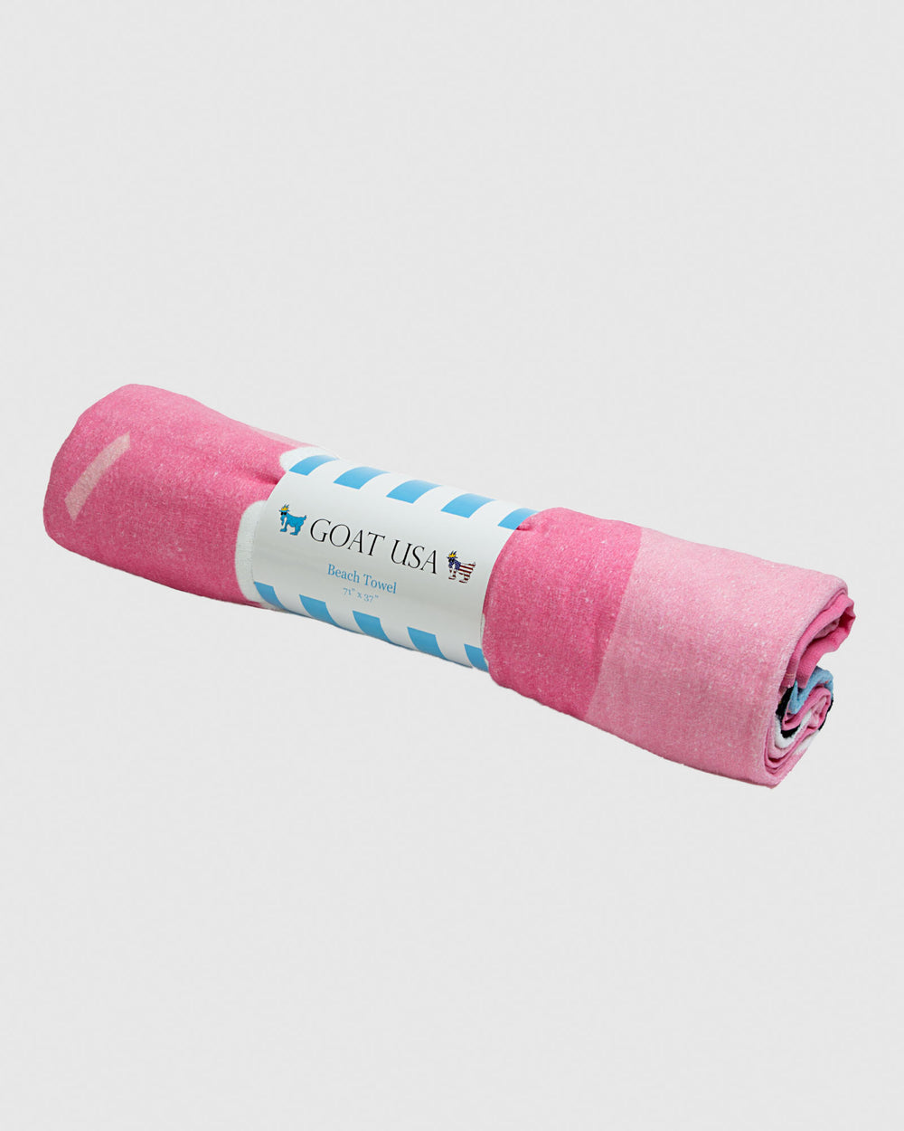 Rolled up pink beach towel
