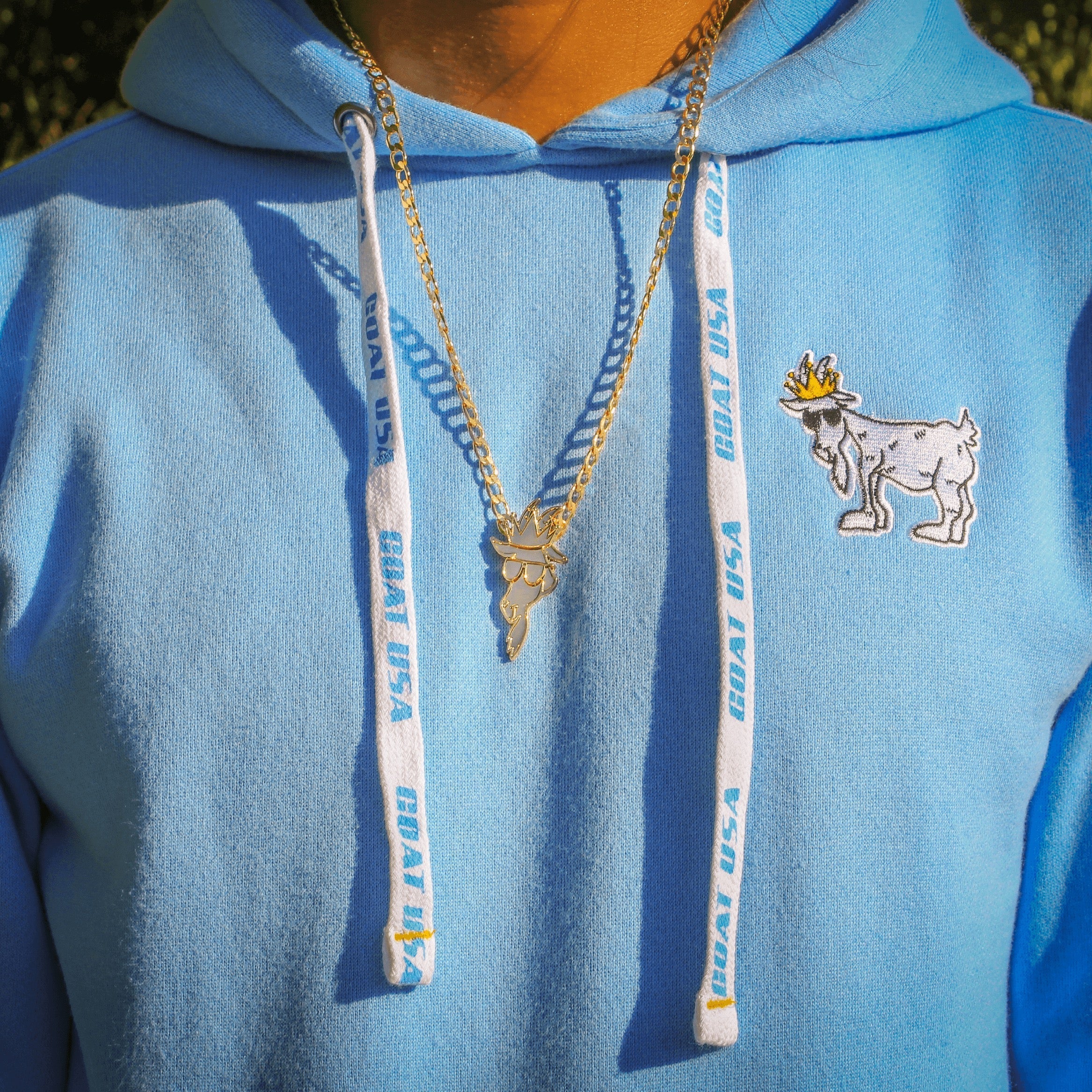 Carolina Blue Hooded Sweatshirt with Gold Chain