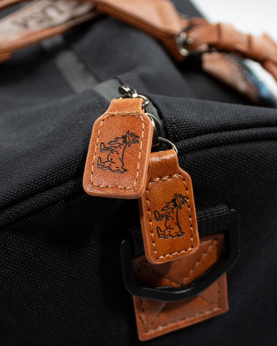 Close up of zippers on black OG Duffel Bag#color_black
