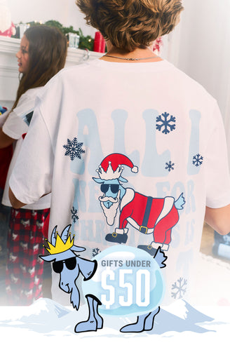 Person wearing a white t-shirt with cartoon characters and text in a casual indoor setting.