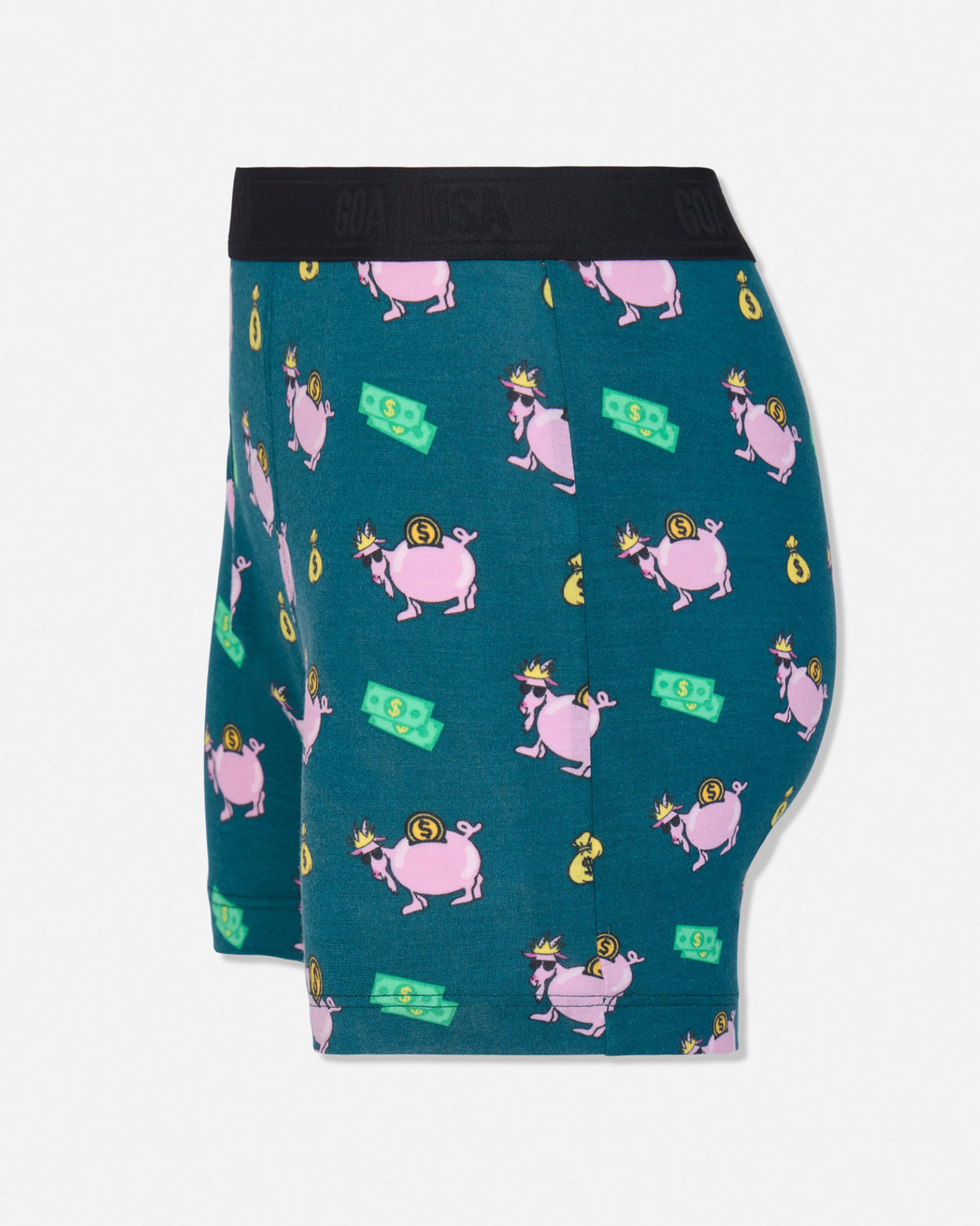 A pair of men's boxer briefs featuring a dark teal background with a repeating pattern of pink pigs wearing gold crowns and holding green money bills, finished with a black elastic waistband.