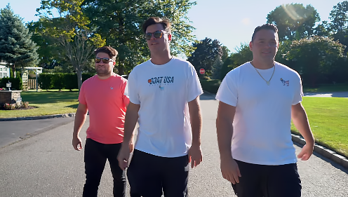 Three GOAT USA founders walking together outdoors