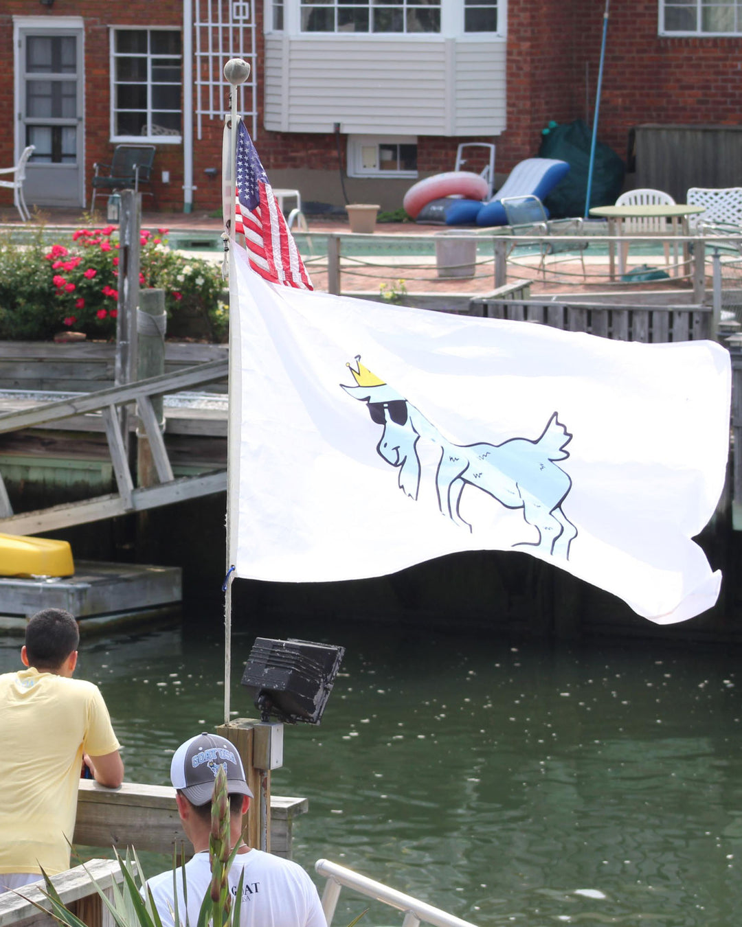 White GOAT Flag with carolina blue goat flowing in the wind#color_white
