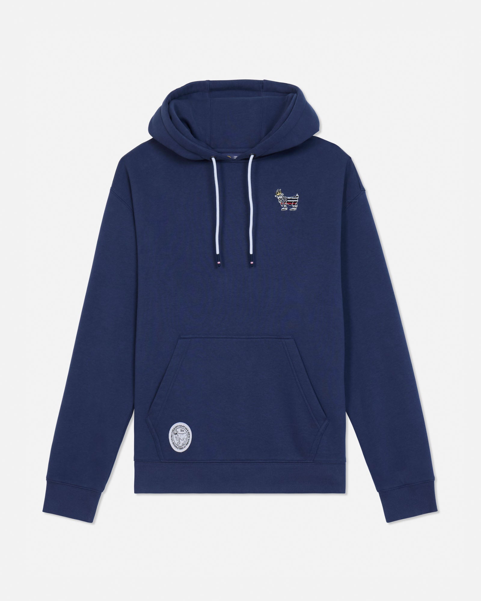 A navy blue pullover hoodie with white drawstrings, featuring a small embroidered graphic on the left chest and a circular patch on the lower left front pocket, displayed against a light gray background.