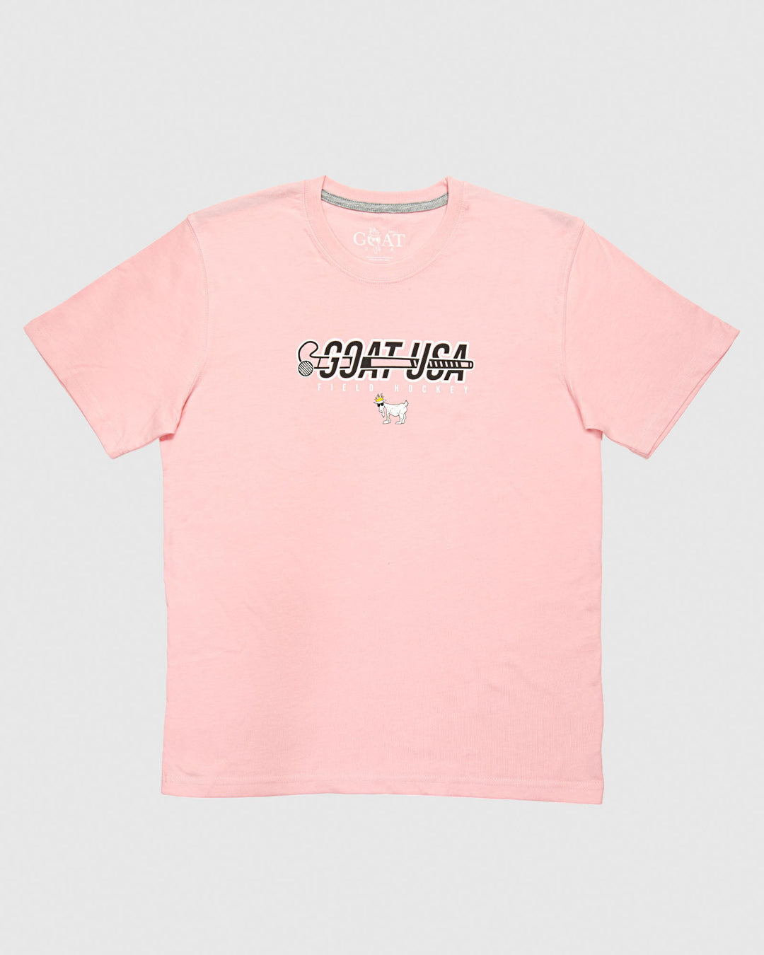 Pink shirt with field hockey stick that goes through the wording "GOAT USA"