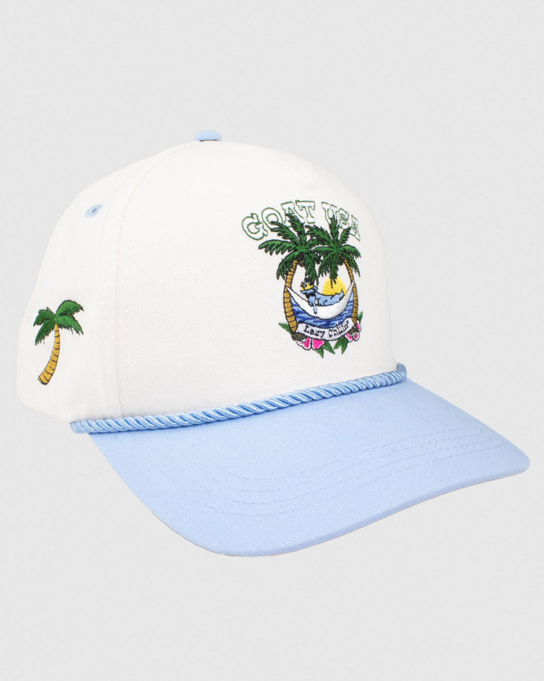 Cream hat with blue rope and brim. Features a palm tree sunset design