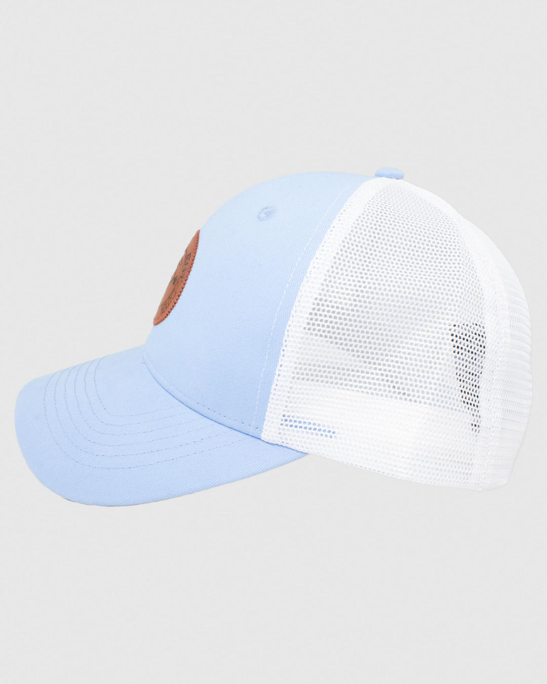 Side view of carolina blue hat with white mesh and brown leather patch#color_carolina-blue