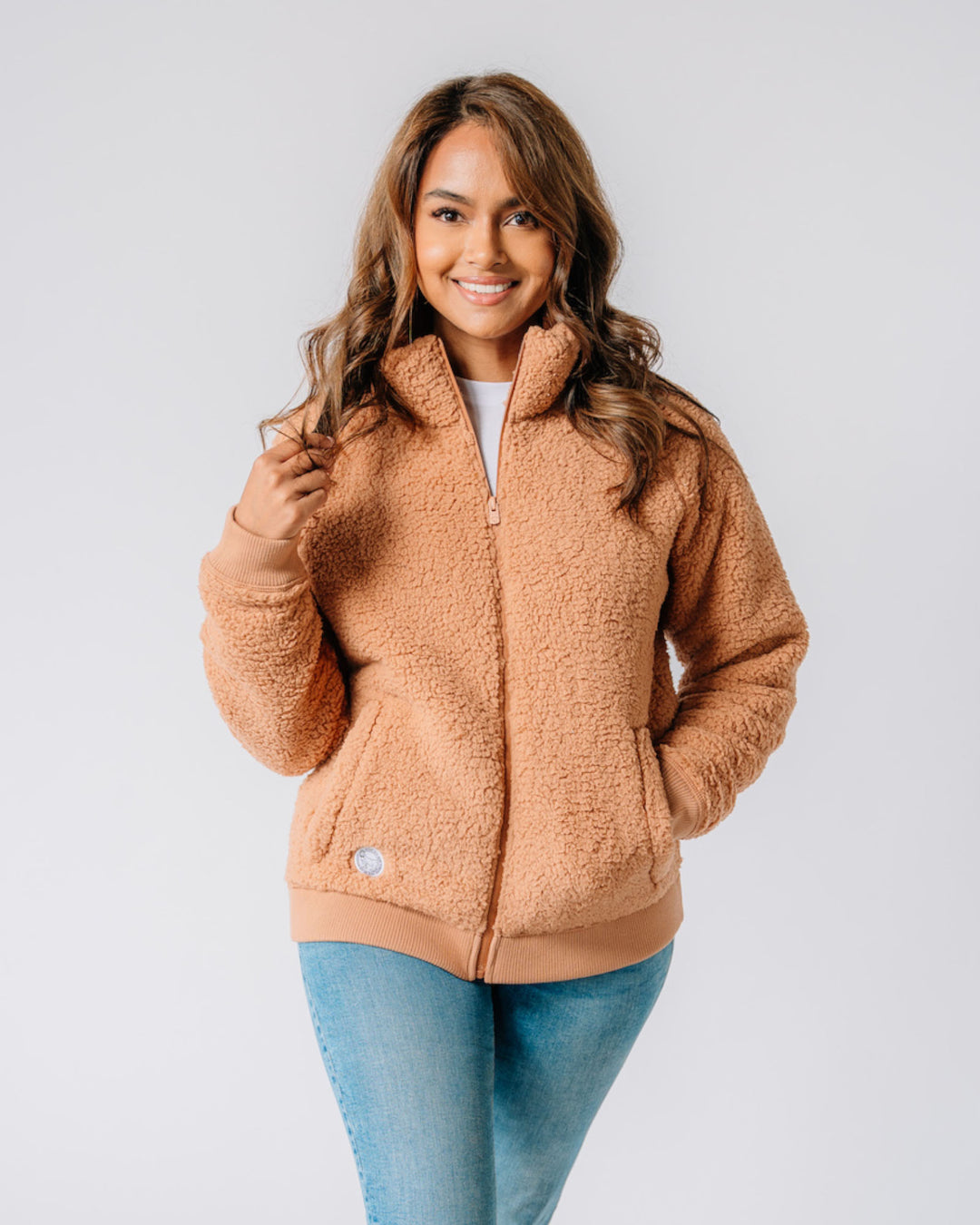 Model wearing almond Women's Sherpa Full Zip Jacket#color_almond