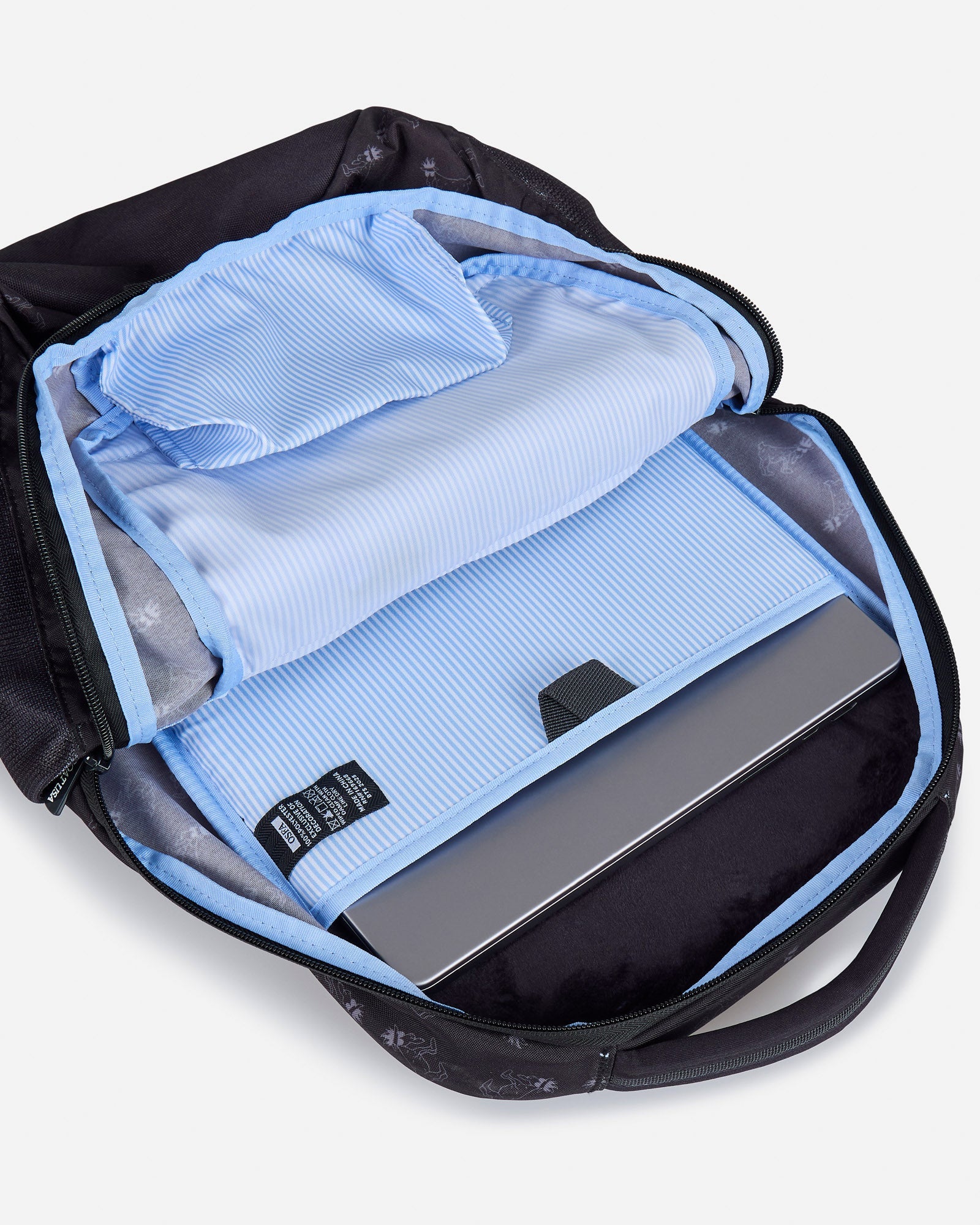 Open black backpack with blue lining and a laptop inside#color_black
