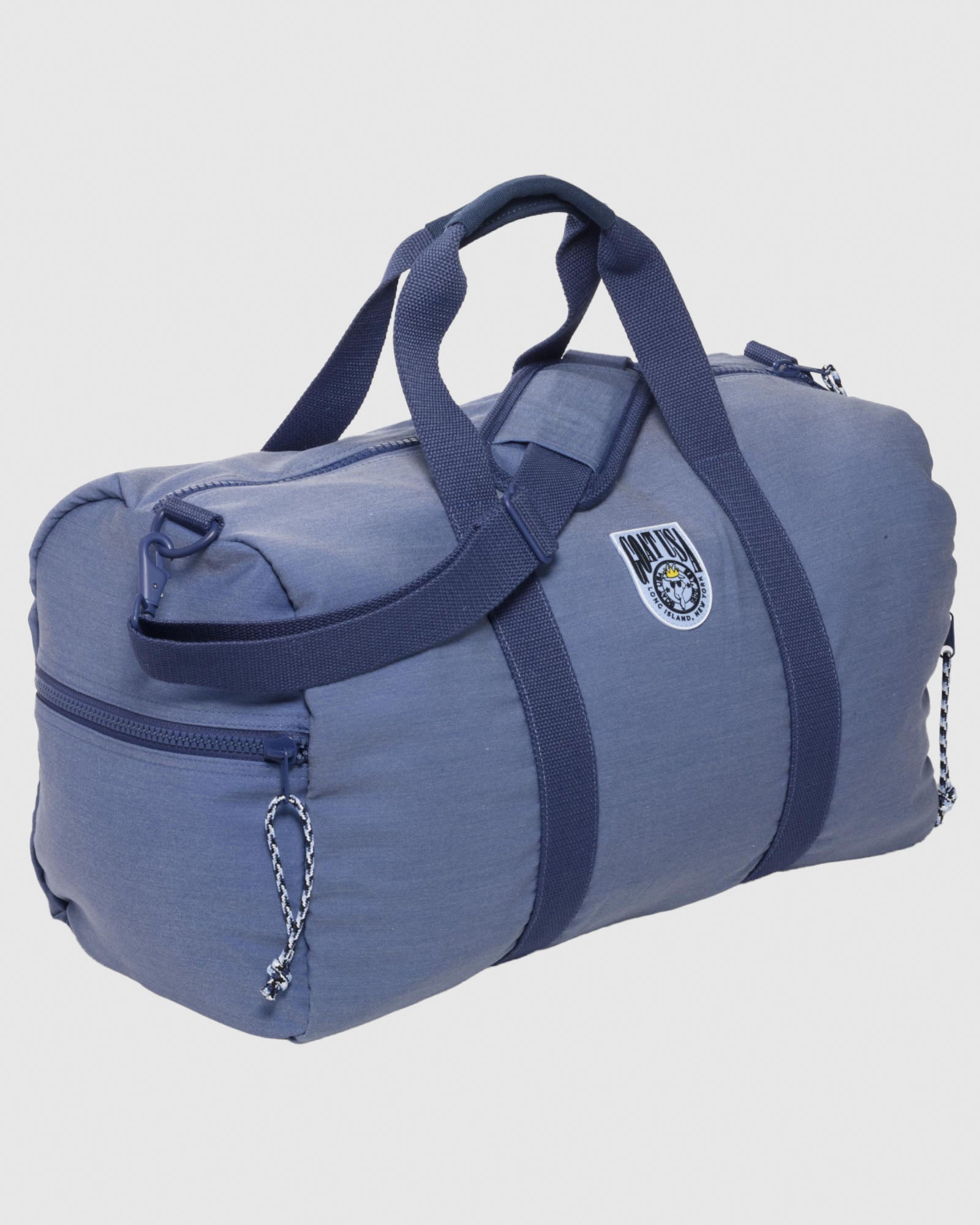 Angled view of navy duffle bag#color_navy