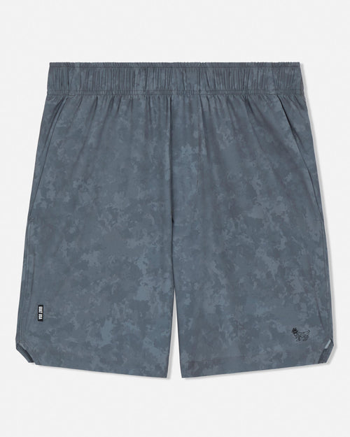 Gray camo patterned shorts on a white background#color_storm-gray-camo