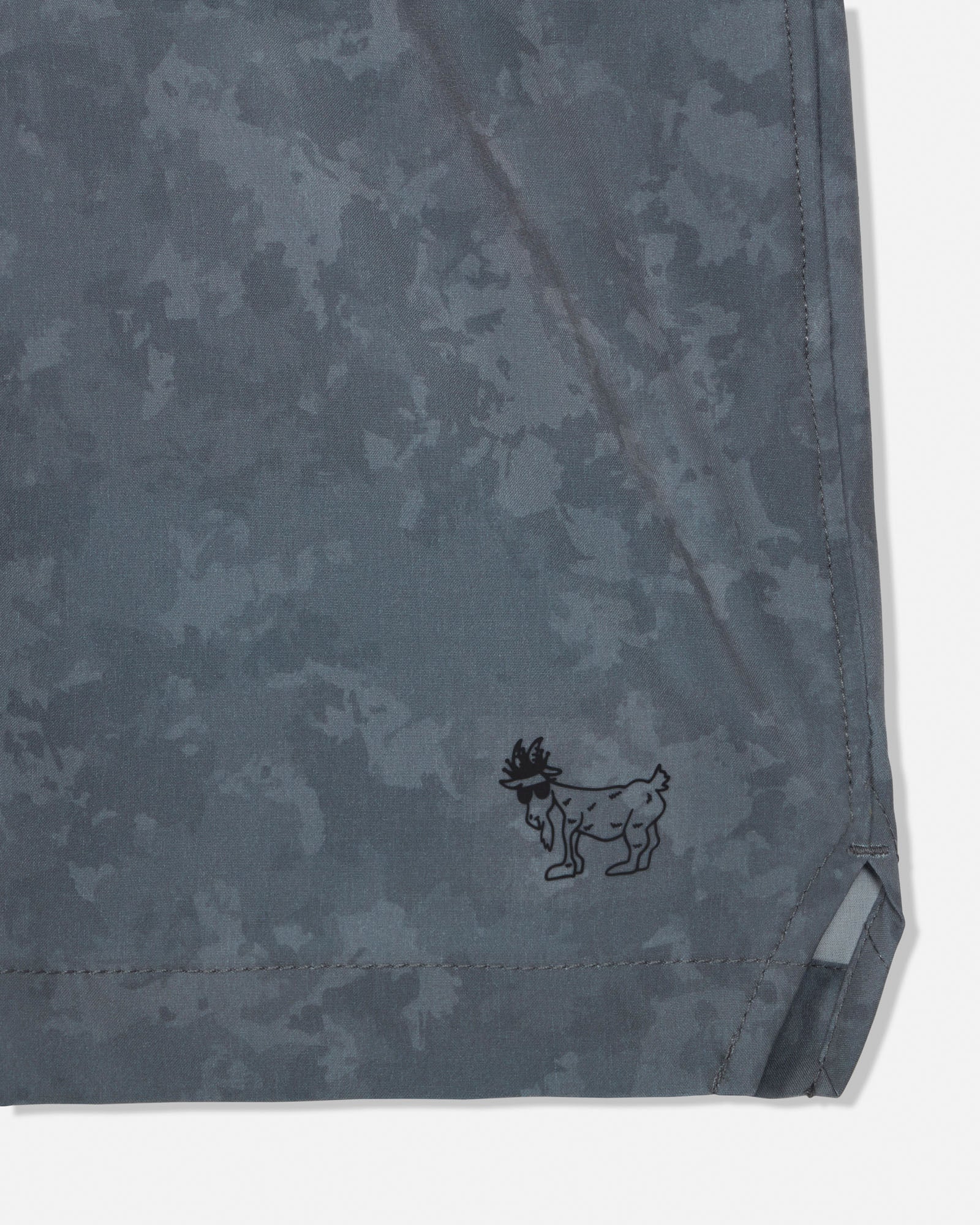 Gray camouflage fabric with a small logo on a white background#color_storm-gray-camo