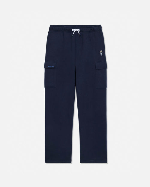 Navy blue cargo sweatpants with a white drawstring, featuring a small embroidered logo on the left thigh and a small brand patch on the right pocket, shown against a light gray background.#color_navy-blazer