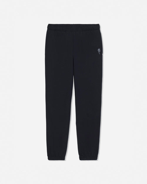 Black sweatpants with an elastic waistband and cuffs, featuring a small embroidered logo on the left hip, displayed against a light gray background.#color_black