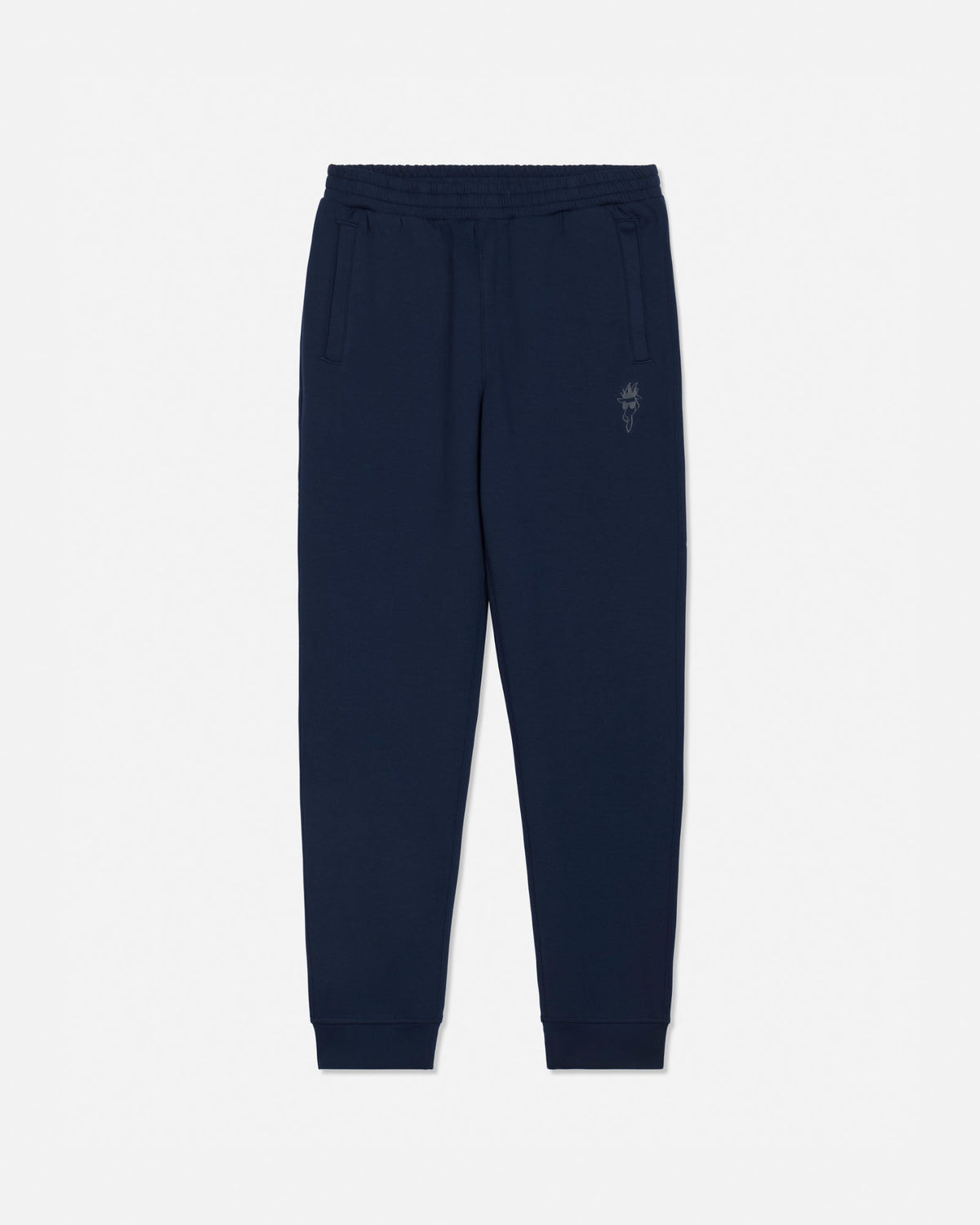 A pair of navy blue sweatpants with an elastic waistband, side pockets, and a small embroidered logo on the left thigh, shown against a plain light gray background.#color_navy-blazer