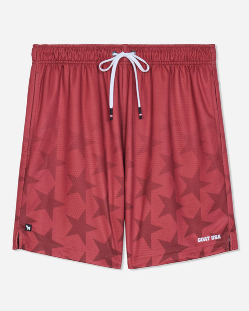 Front of red mesh shorts with a star pattern#color_tomato