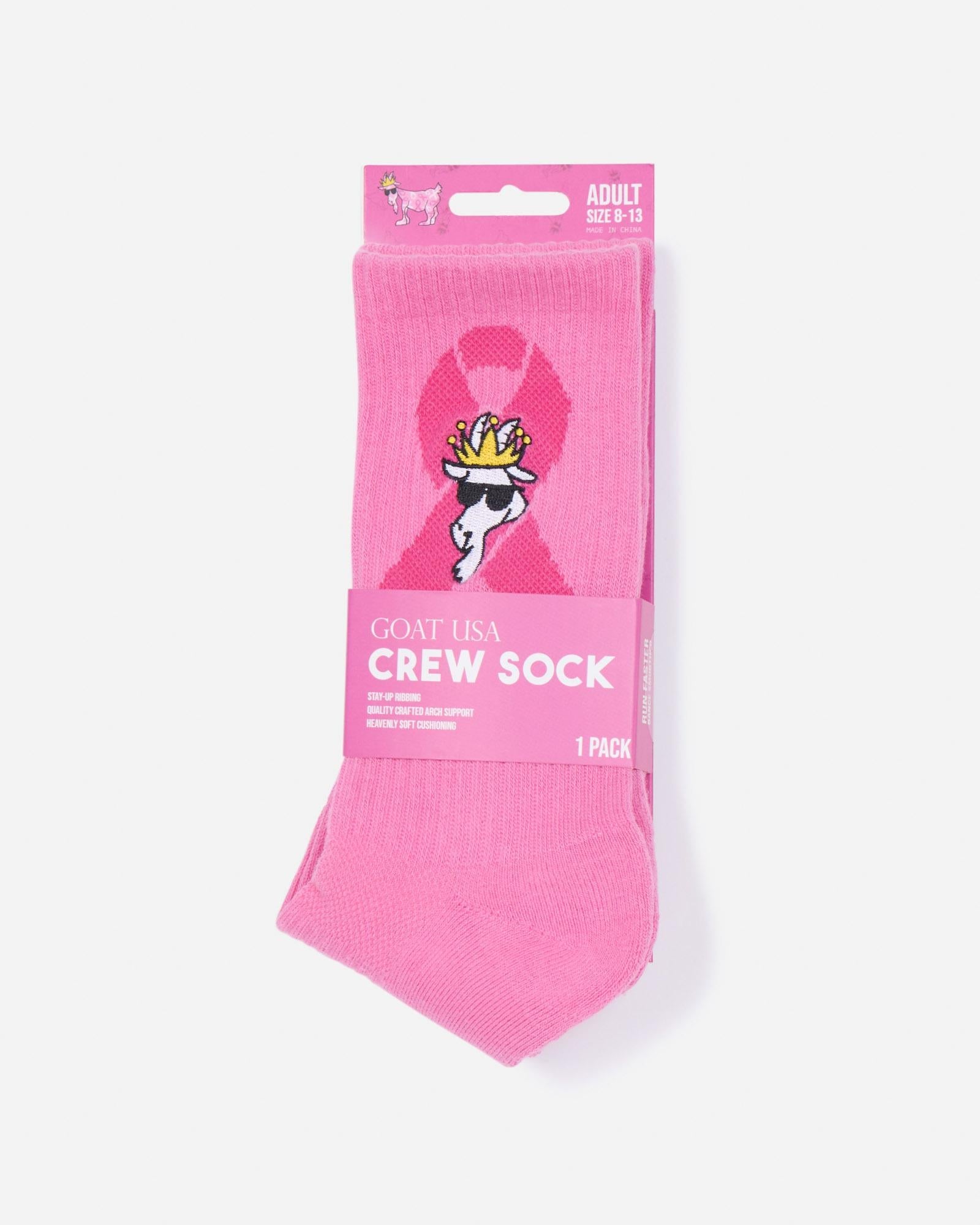Pink socks with the Breast Cancer Awareness logo and a white goat in the packaging