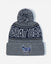A gray and navy blue knit beanie with a gray pom-pom, featuring 'GOAT USA' in white lettering on a navy band and a small goat mascot patch on the front cuff.