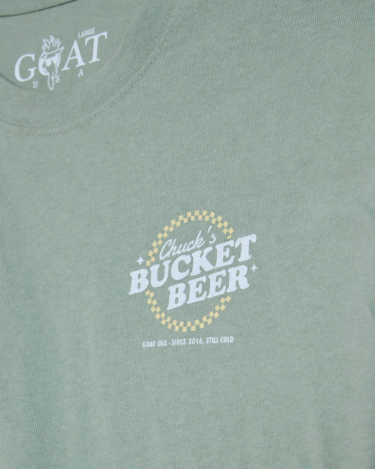 'Chuck's Bucket Beer' left-chest graphic on steeped sage t-shirt