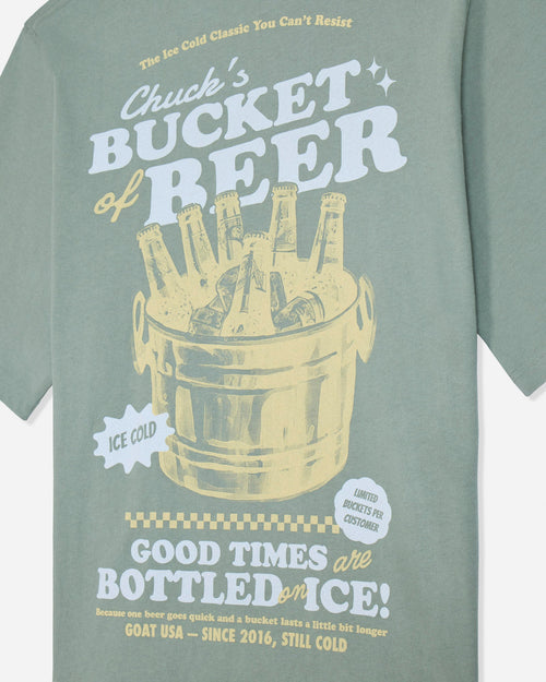 Close-up of steeped sage t-shirt with bucket of beers graphic and various lines of text