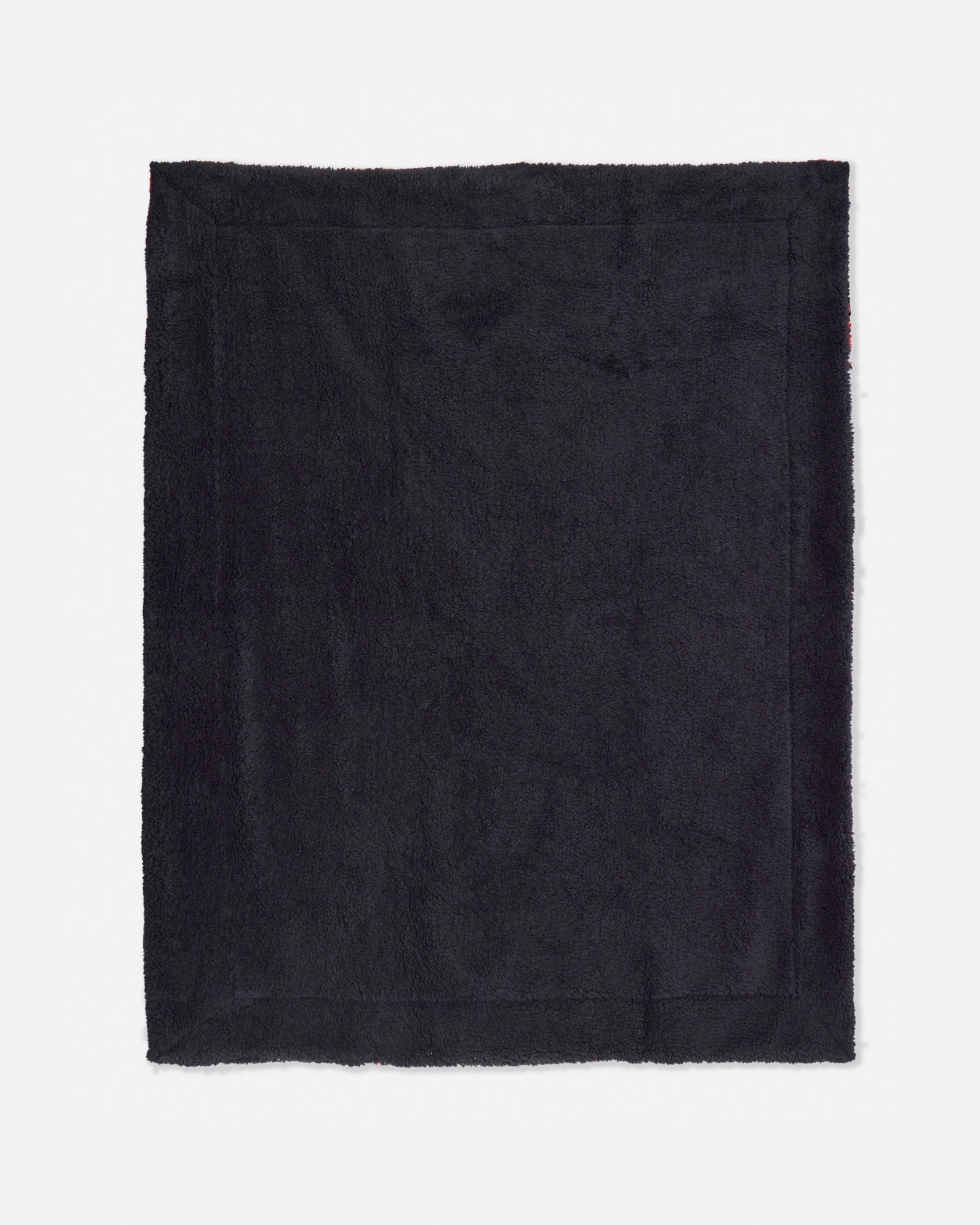 Black blanket on a white background