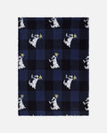 A rectangular woven textile, likely a blanket or throw, featuring a navy and black buffalo plaid pattern overlaid with a repeating motif of white goats wearing yellow crowns. The textile is shown flat against a light gray background.
