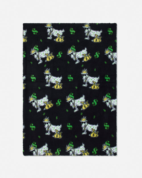 A rectangular black fleece blanket featuring a repeating pattern of white Scottish terriers wearing gold collars and green hats, with green dollar signs.
