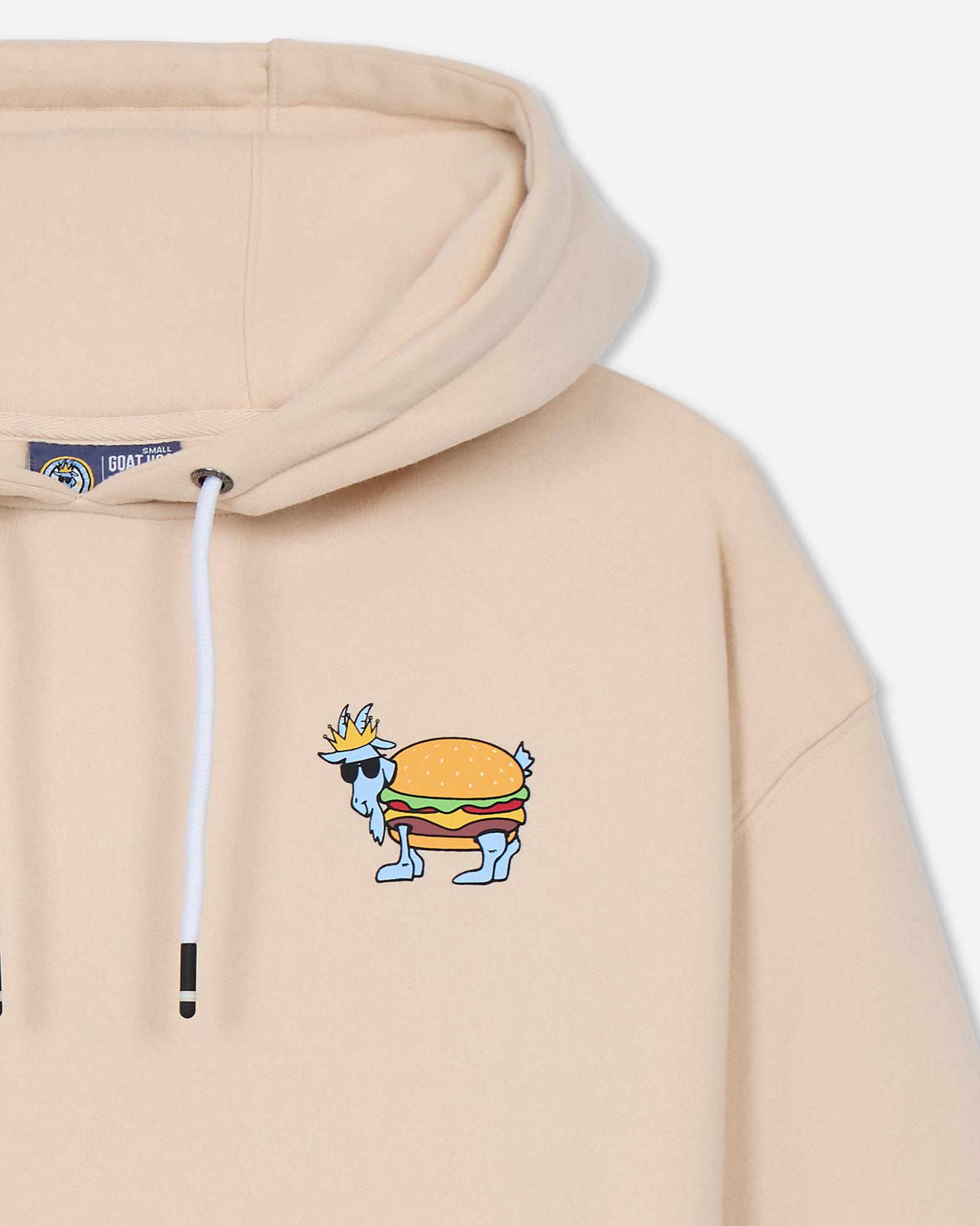 Beige hoodie with a cartoon hamburger design on a light gray background