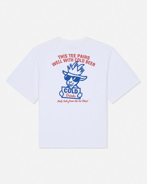 White short-sleeve t-shirt shown from the back, featuring a blue cartoon goat graphic with sunglasses and a cowboy hat, surrounded by red and blue text that reads 'THIS TEE PAIRS WELL WITH COLD BEER' and 'Only take from the ice chest'.