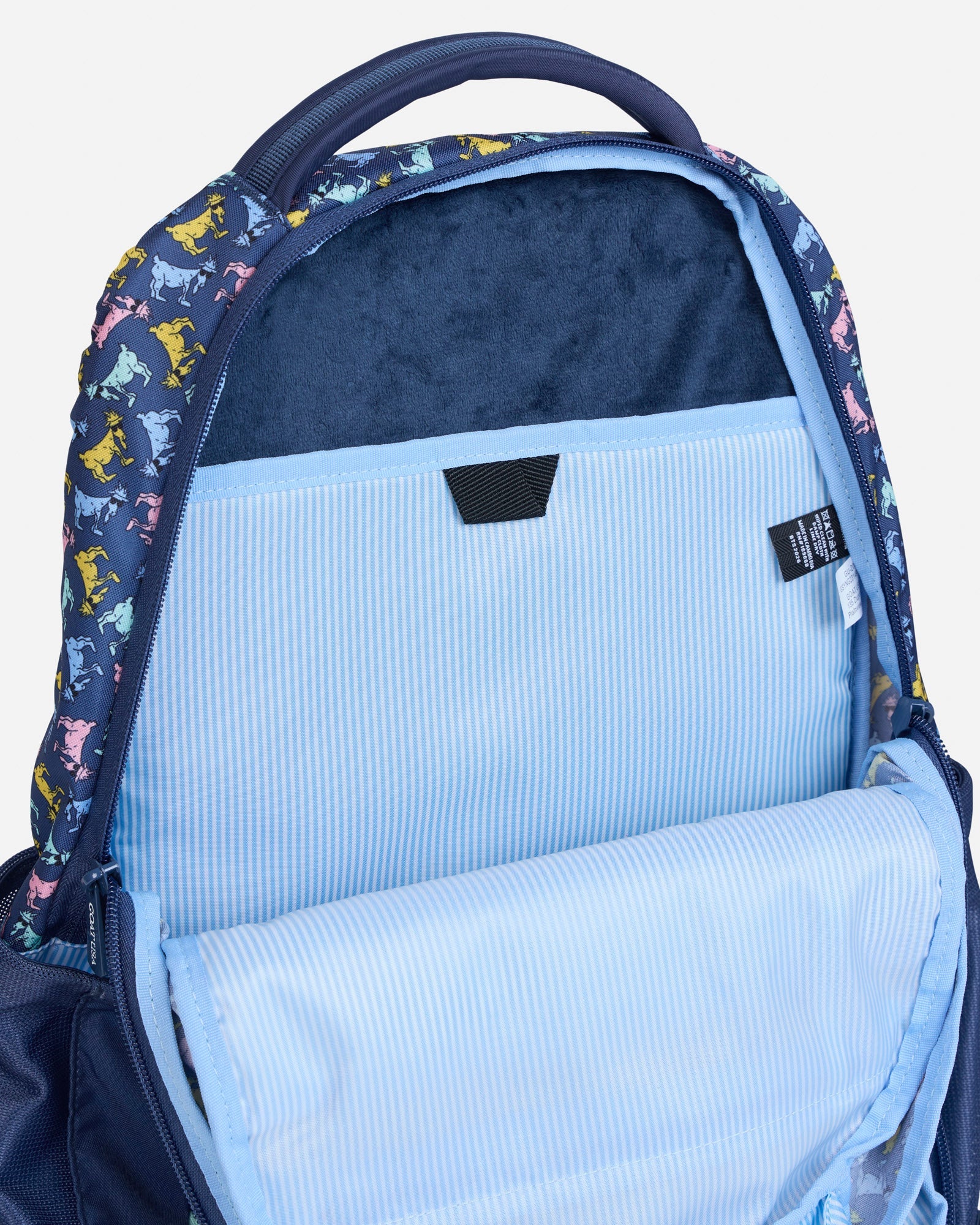 Navy backpack with all-over-goat pattern showcasing the main compartment