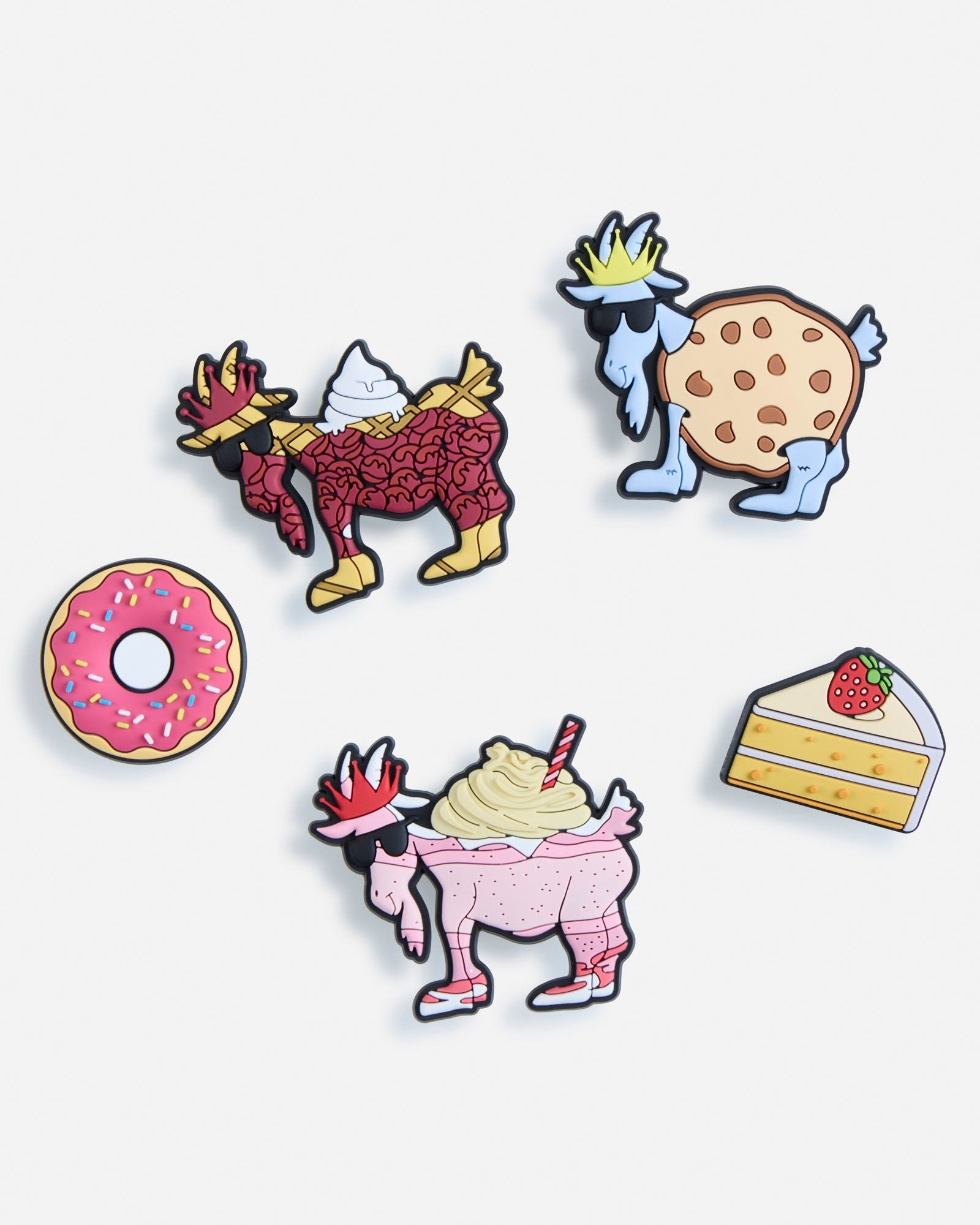 Set of colorful cartoon-style shoe charms on a white background