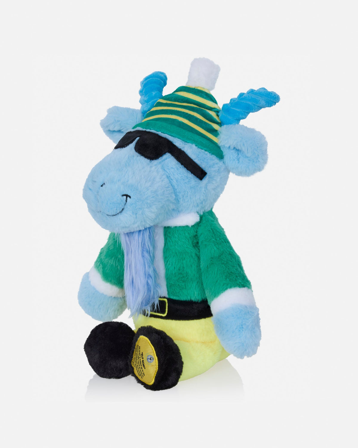 A blue plush toy character dressed in a green and yellow pirate outfit with a striped hat, black sunglasses, and a blue beard, photographed on a light gray background.