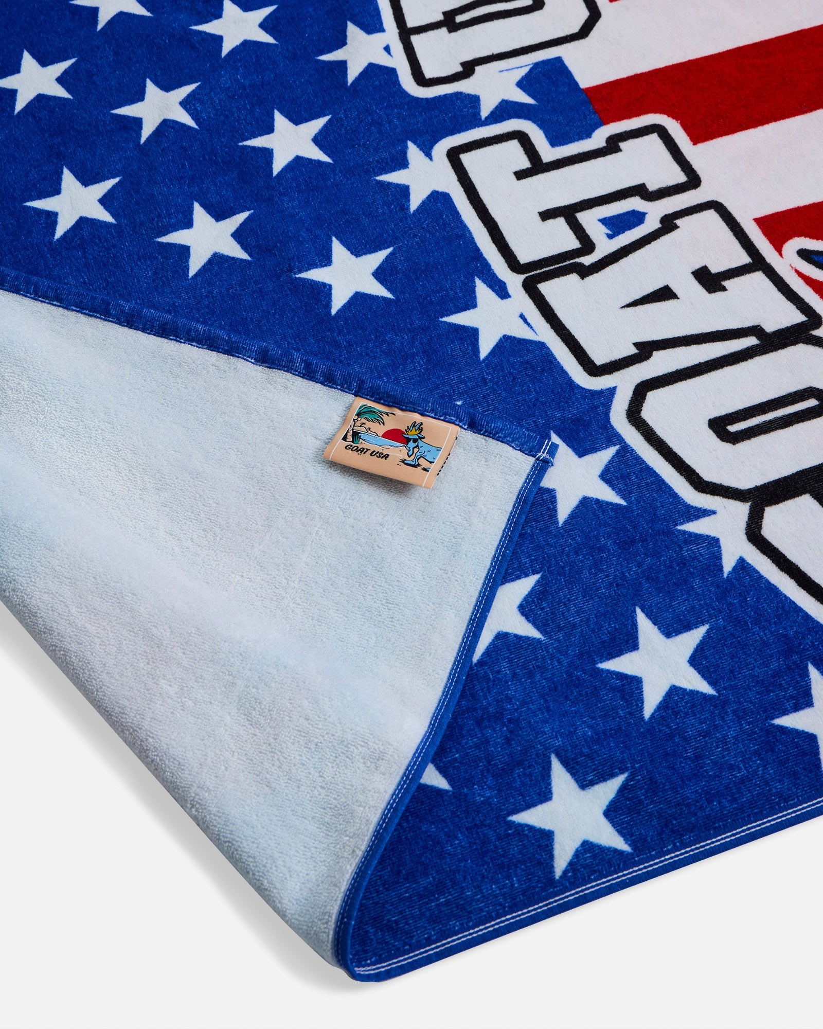 Close-up of American flag GOAT beach towel