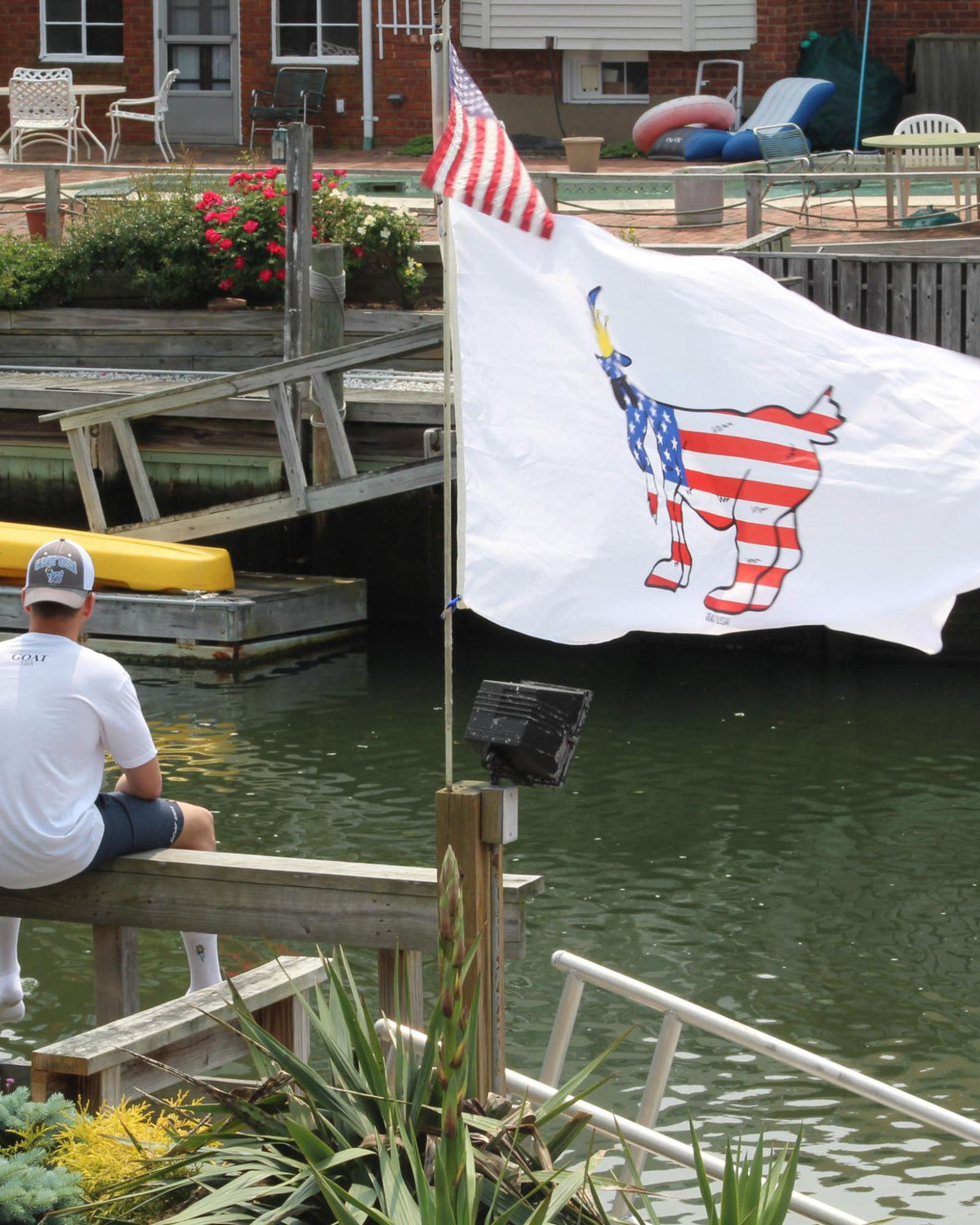 White Freedom GOAT Flag flowing in the wind