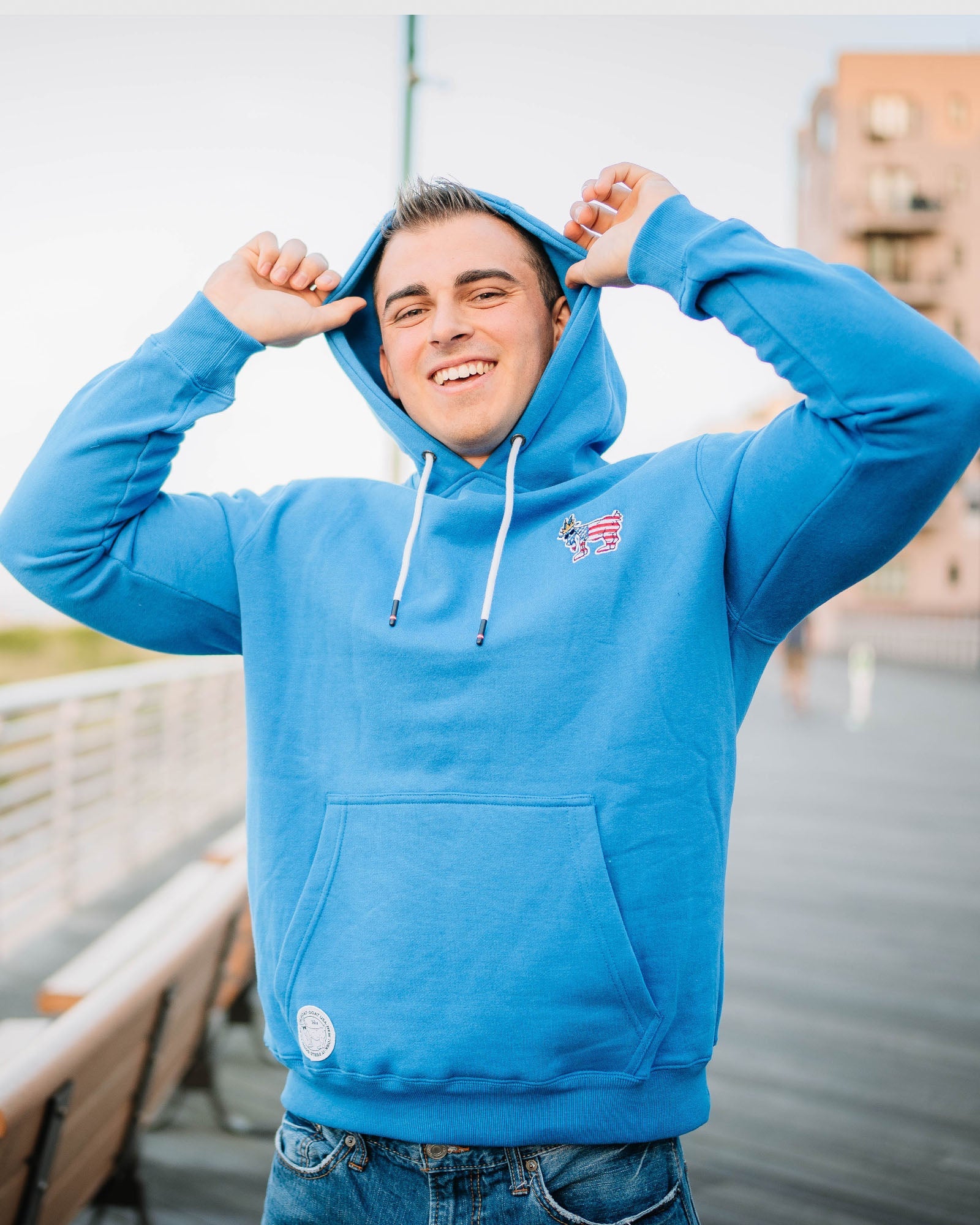 Model wearing royal Freedom Hooded Sweatshirt#color_royal