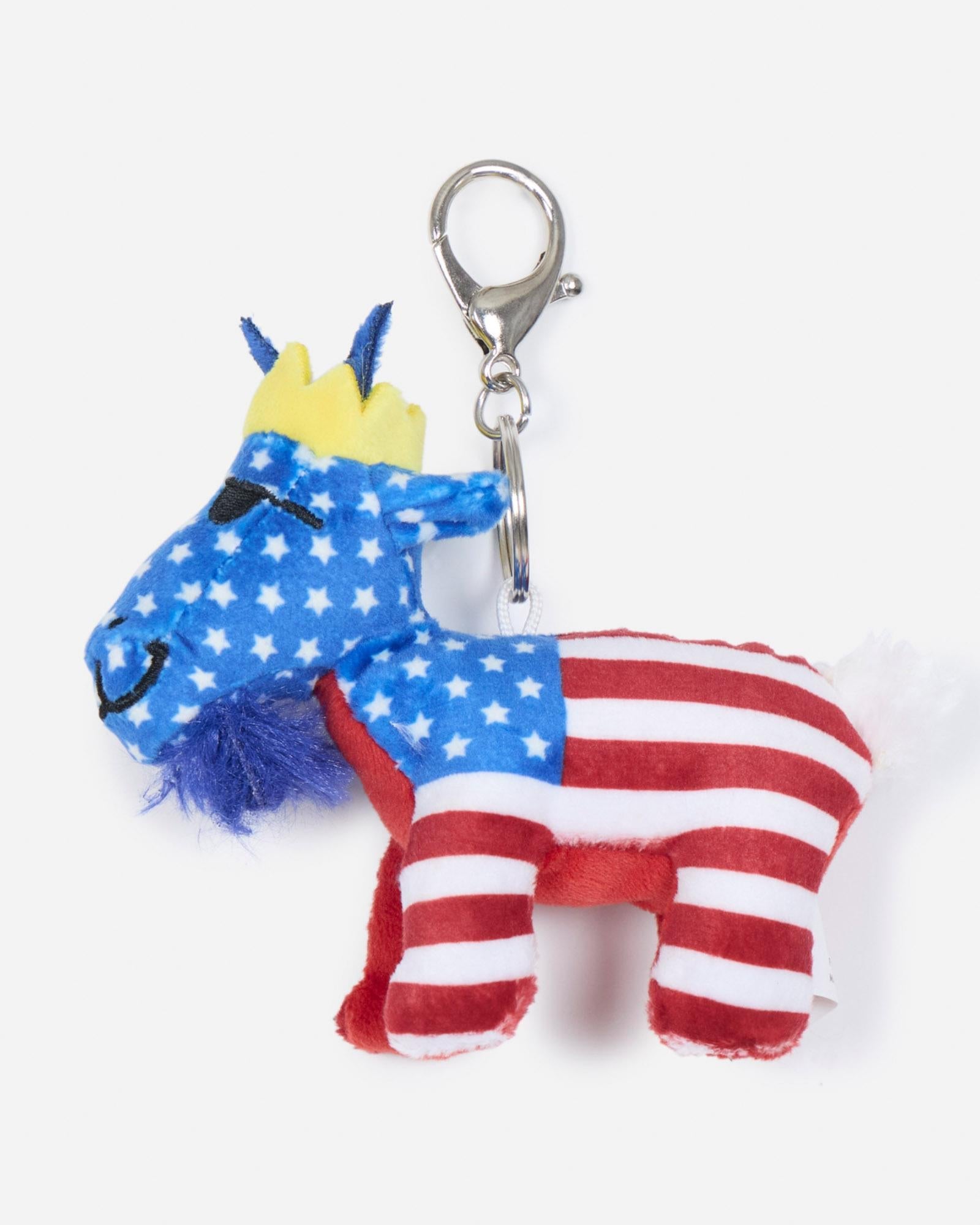 Keychain shaped like a goat with American flag design on a light gray background