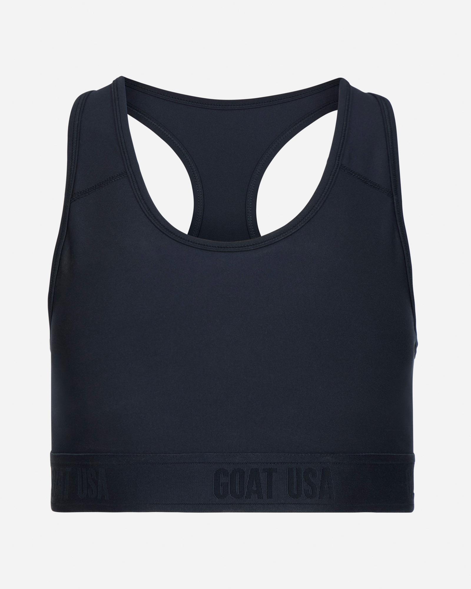 Black sports bra with 'GOAT USA' branding on a light gray background
