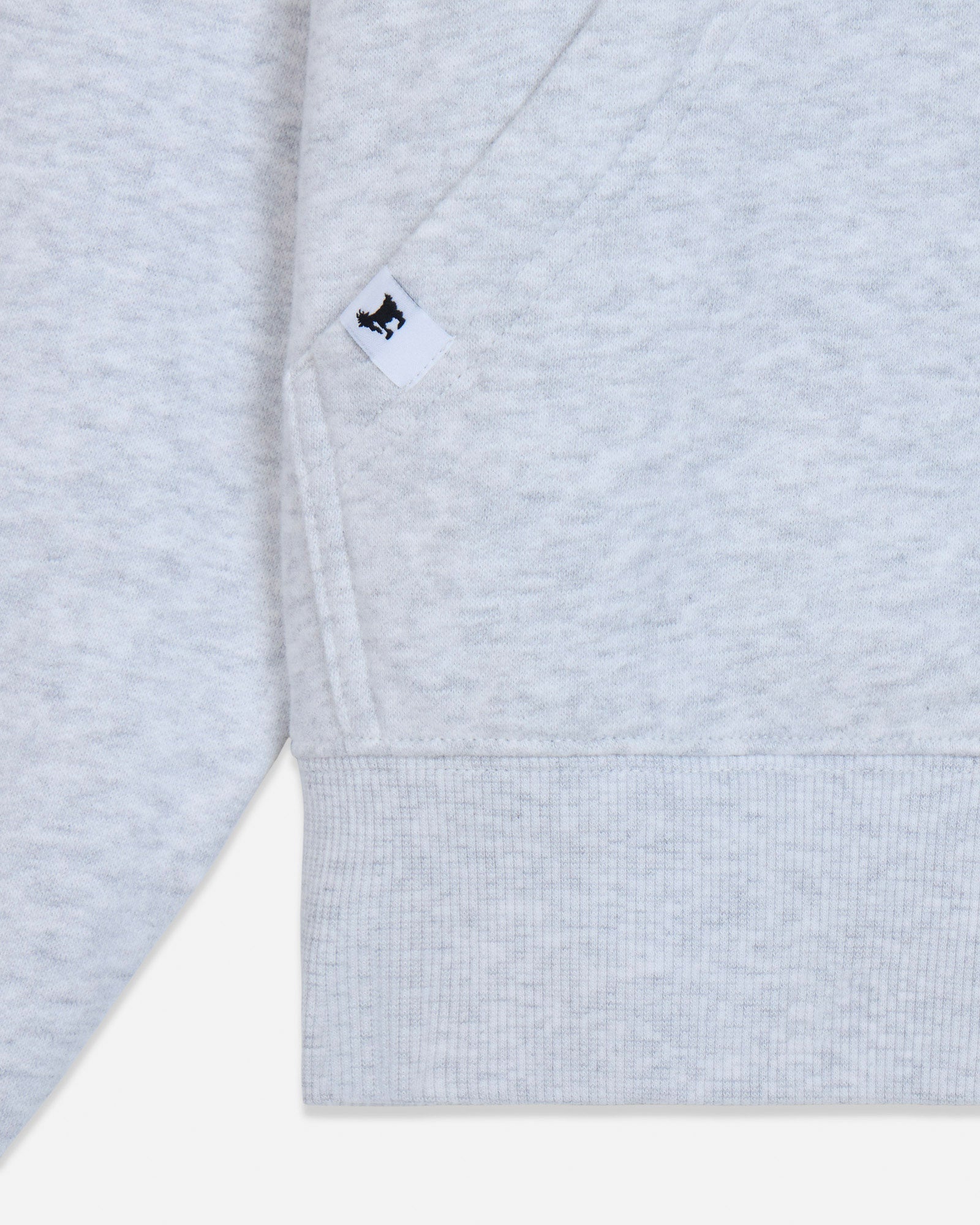 Close-up of gray hoodie seam and pocket#color_pale-gray-heather