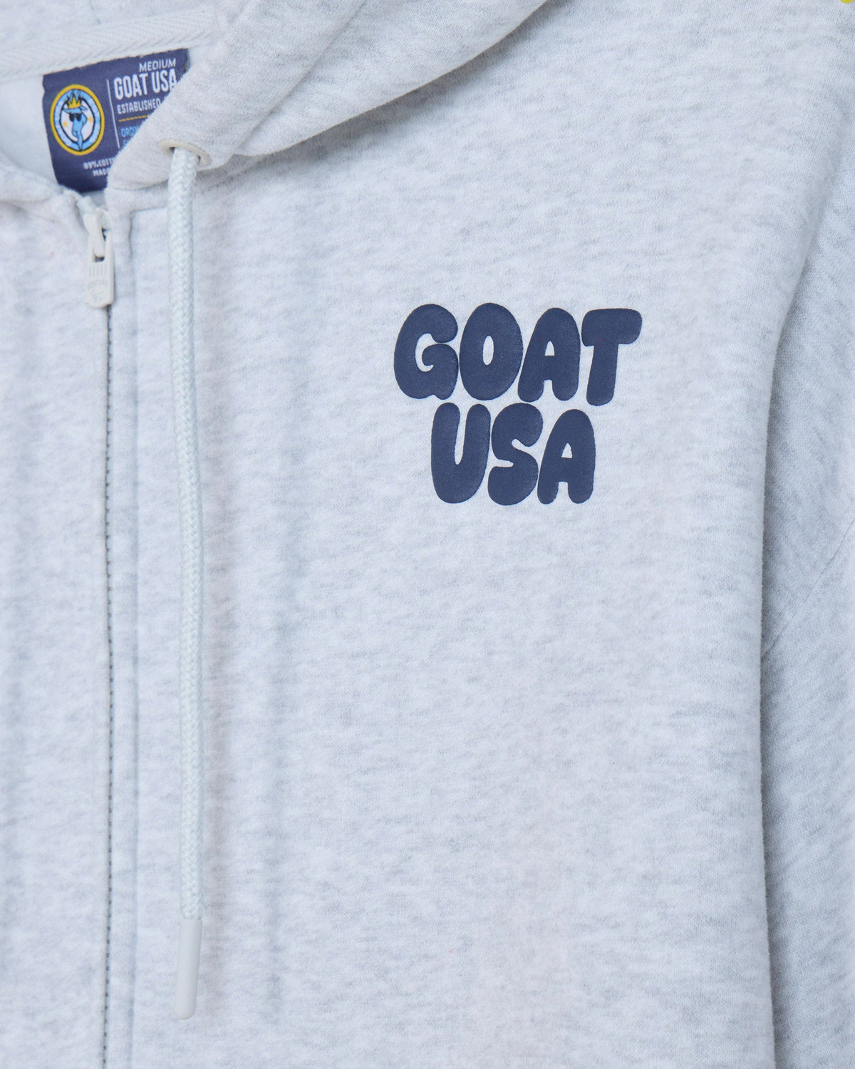 Close-up of front of gray hoodie with 'GOAT USA' left-chest logo text