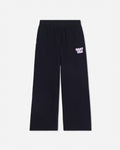 Black wide-leg sweatpants with an elastic waistband and a small white 'GOAT USA' text graphic on the left thigh, shown against a light gray background.