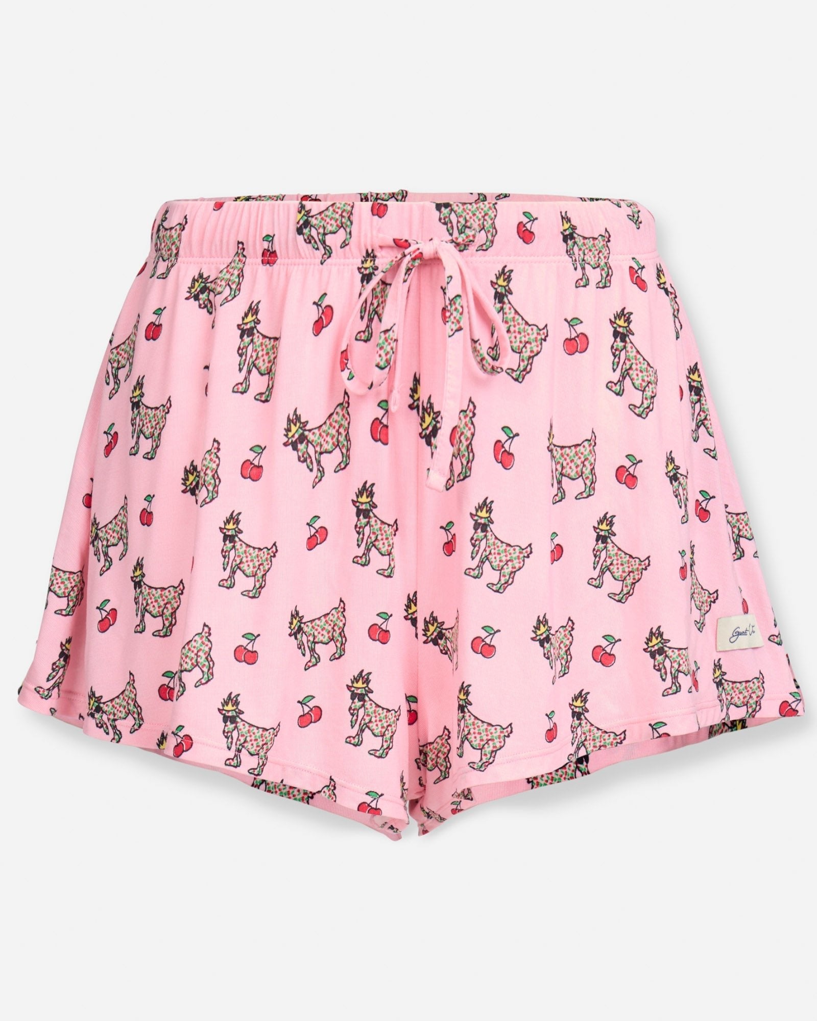 Front of pink shorts with cherries and cherry goats print