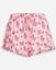 Front of pink shorts with cherries and cherry goats print