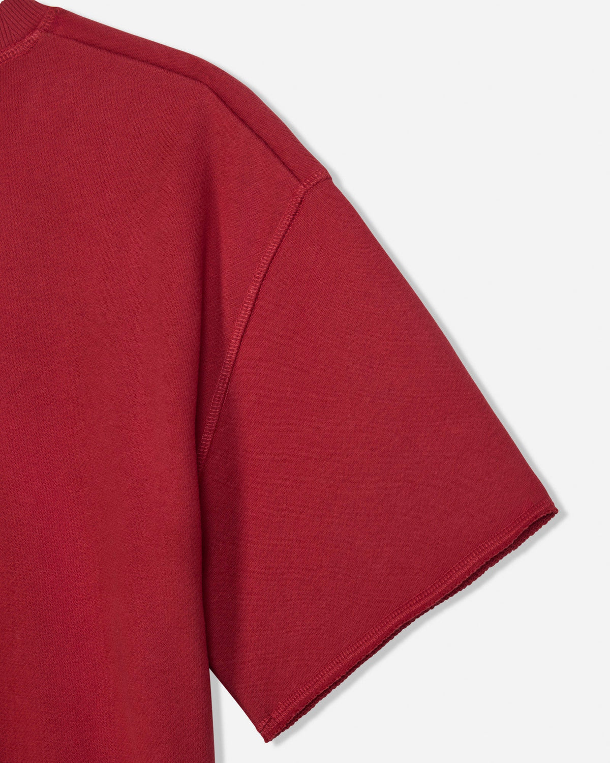 Back shoulder of red french terry tee