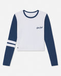 A long-sleeve crop top with a white body and navy blue sleeves, featuring a navy blue crew neck, white stripes on one sleeve, and 'Goat Usa' embroidered on the left chest.