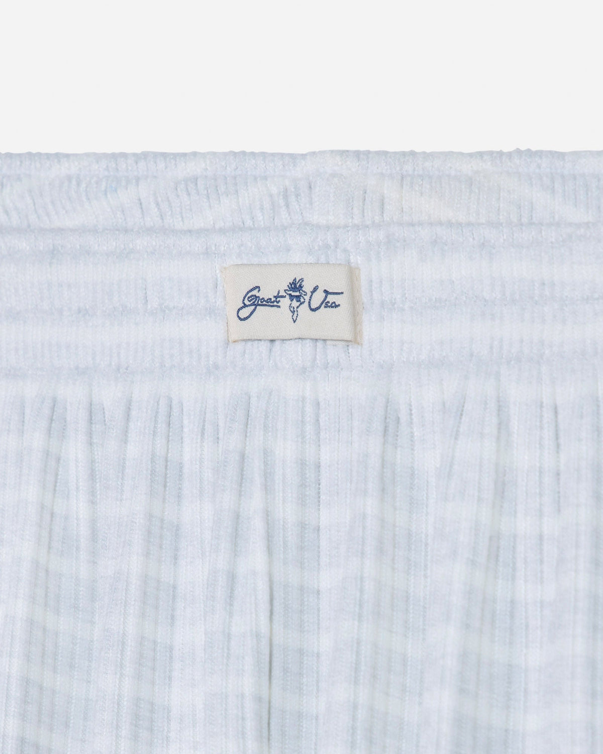 Close-up of gray pajama shorts