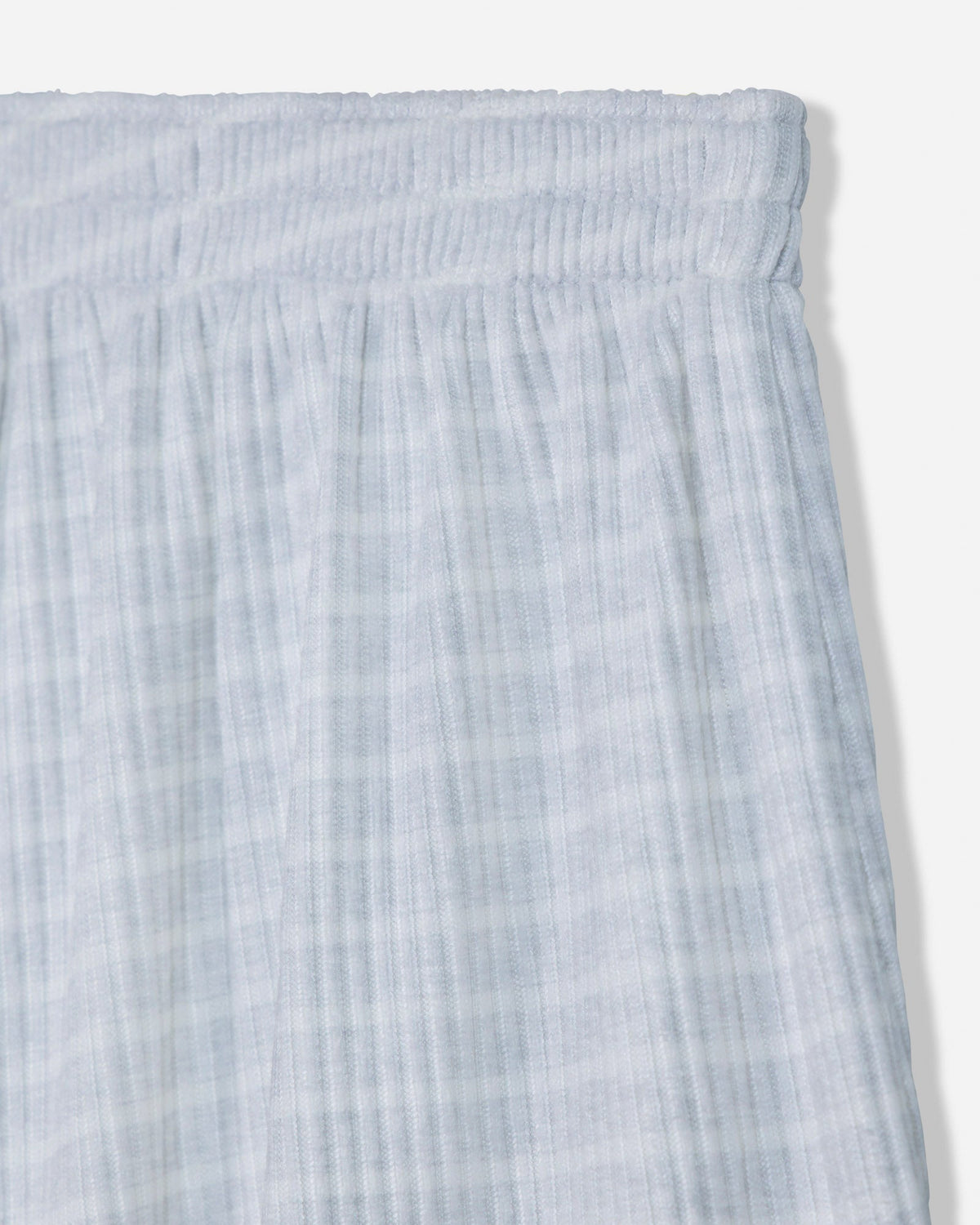 Close-up of waist of gray pajama shorts