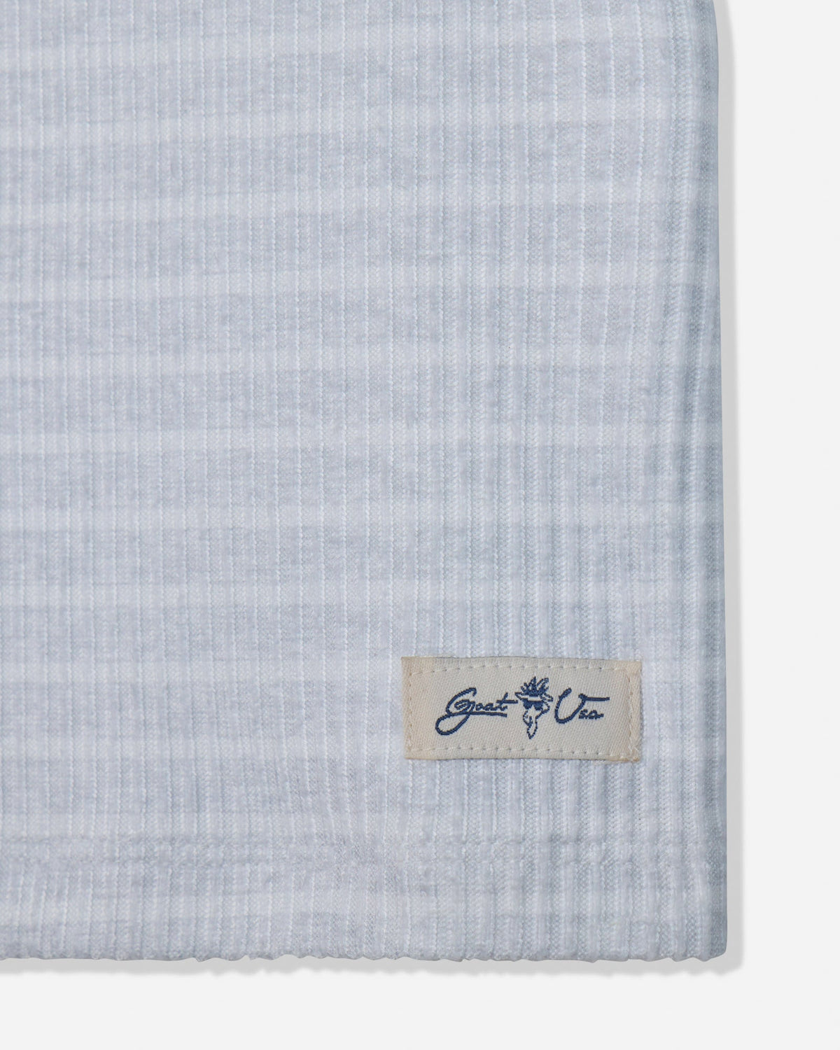 Close-up of patch on pale gray heather pajama tank
