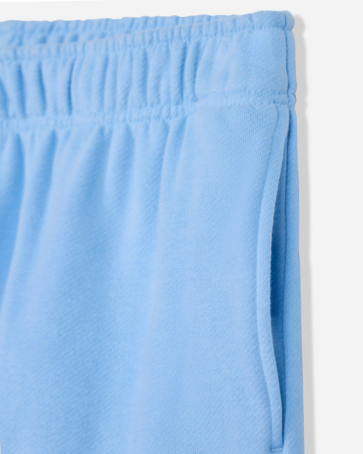 Close-up of pocket of carolina blue sweat shorts