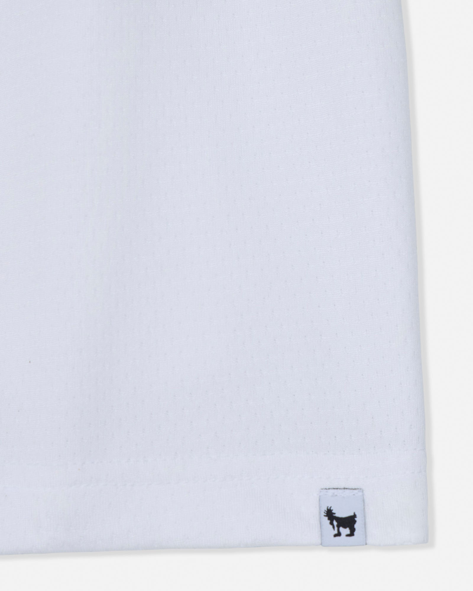White fabric with a small black logo on a white background#color_white